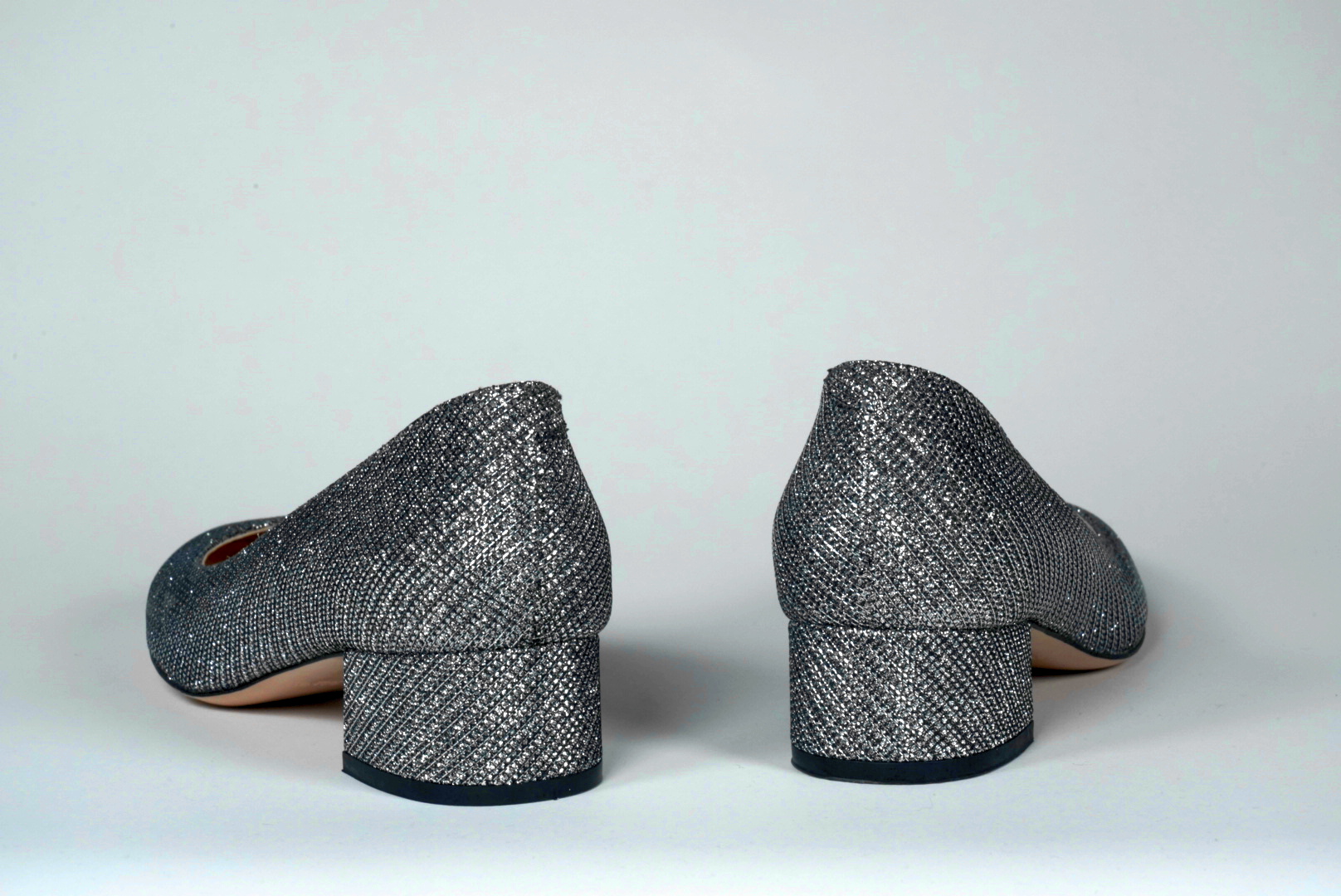silver glitter low block heels